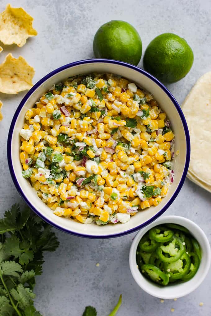 Image of Mexican corn salad in large white bowl.