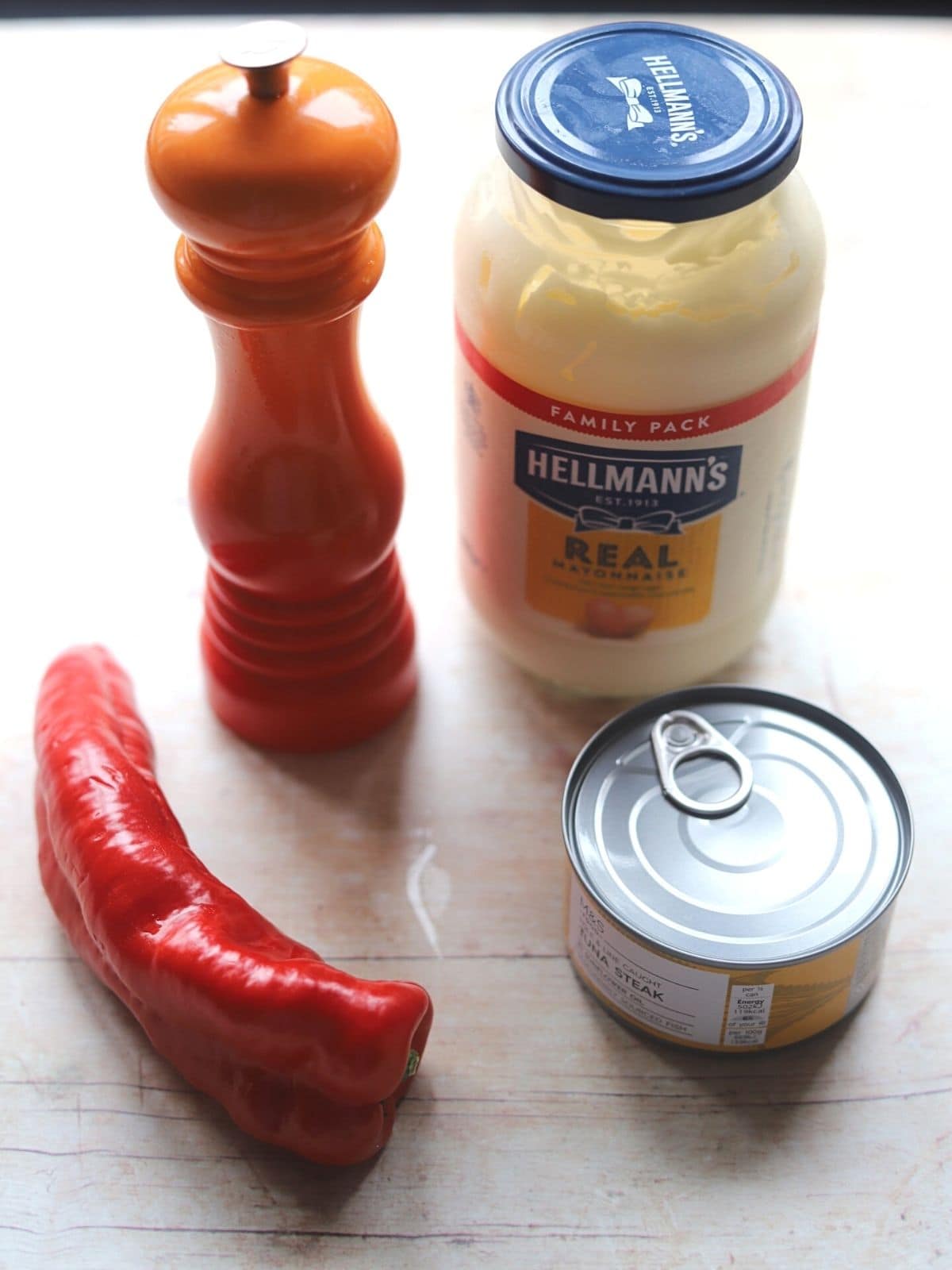 Ingredients for tuna mix on a table.