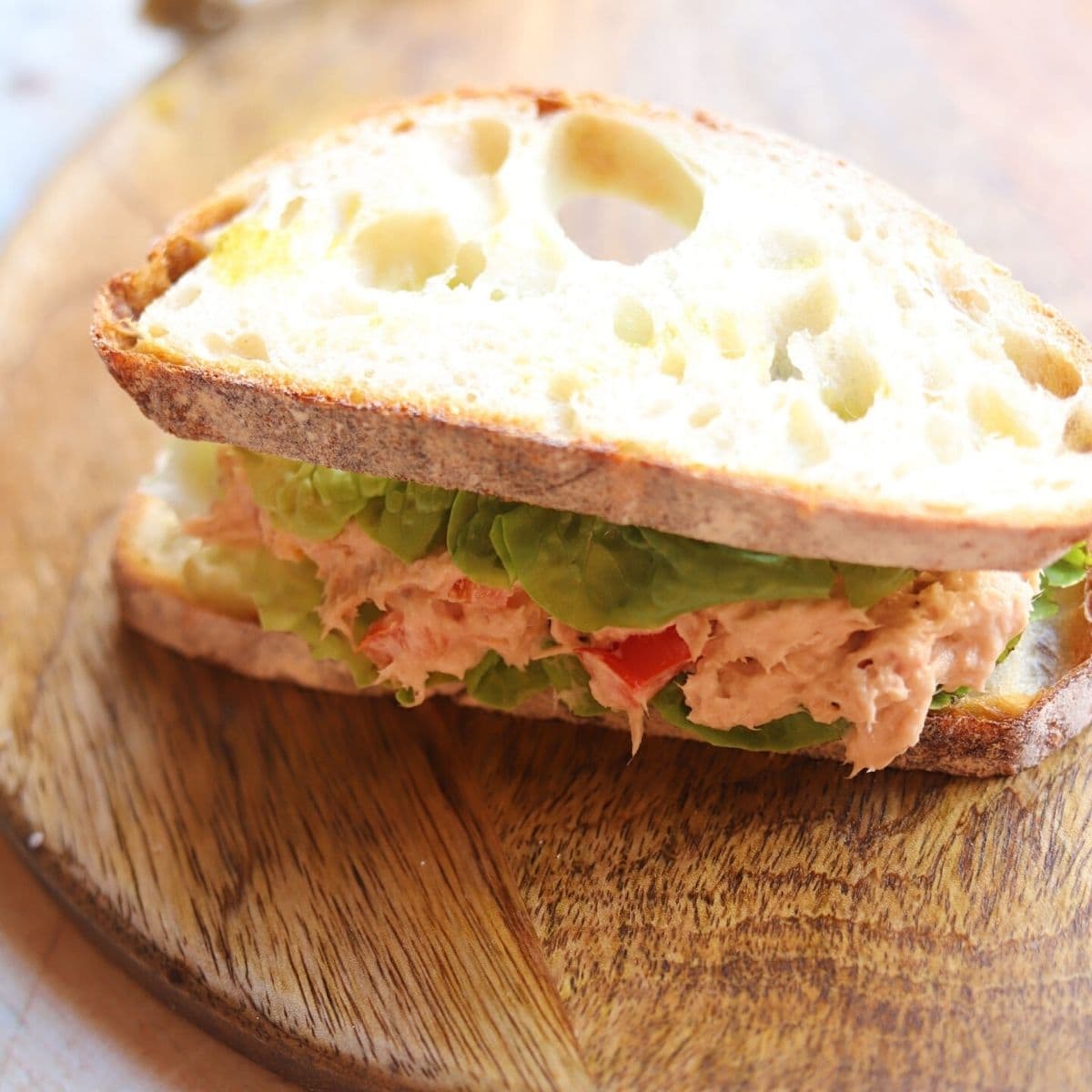 Full sandwich with tuna mix and lettuce.