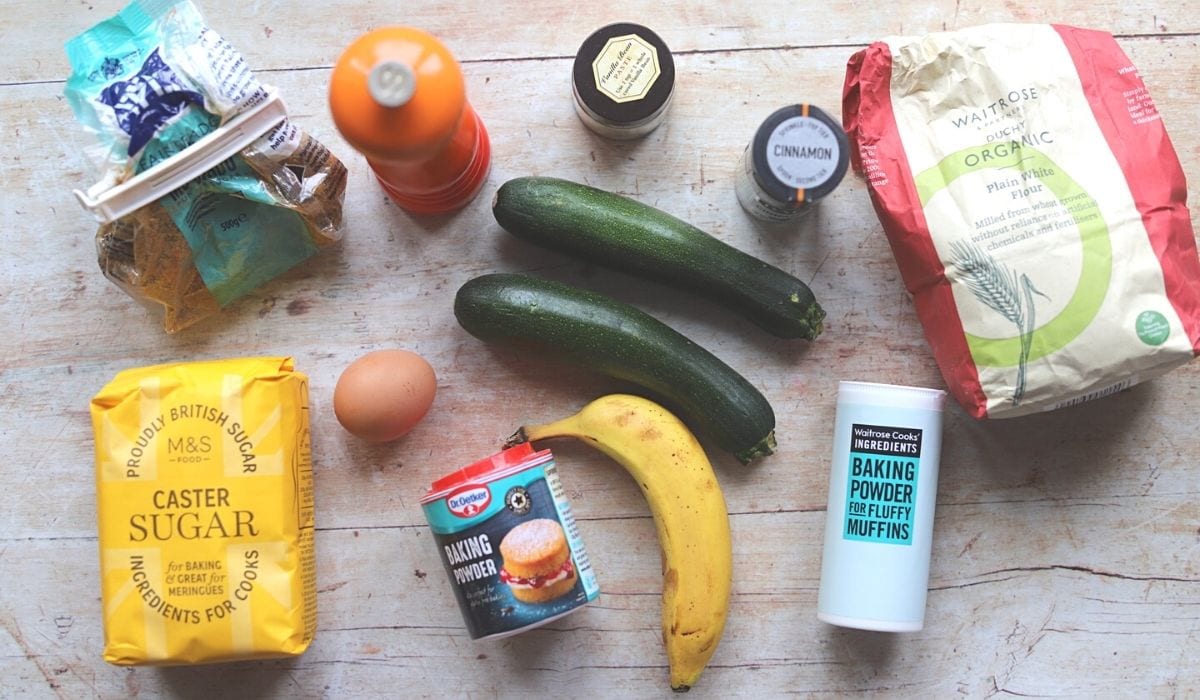 Ingredients laid out on table for zucchini banana bread.