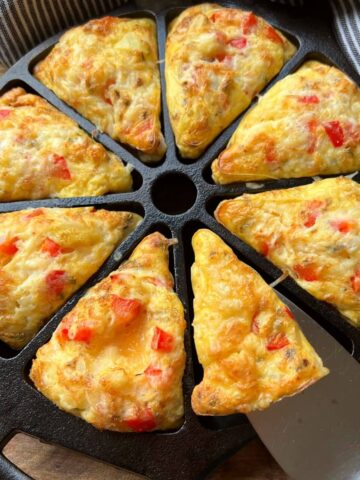 Baked frittata in a cast iron wedge pan.