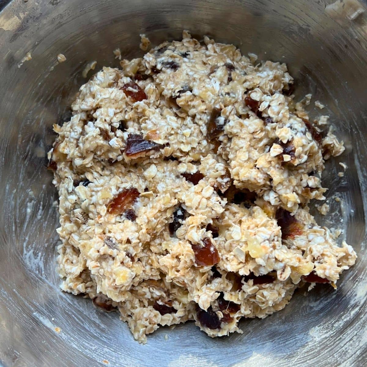 Cookie mixture in metal bowl.