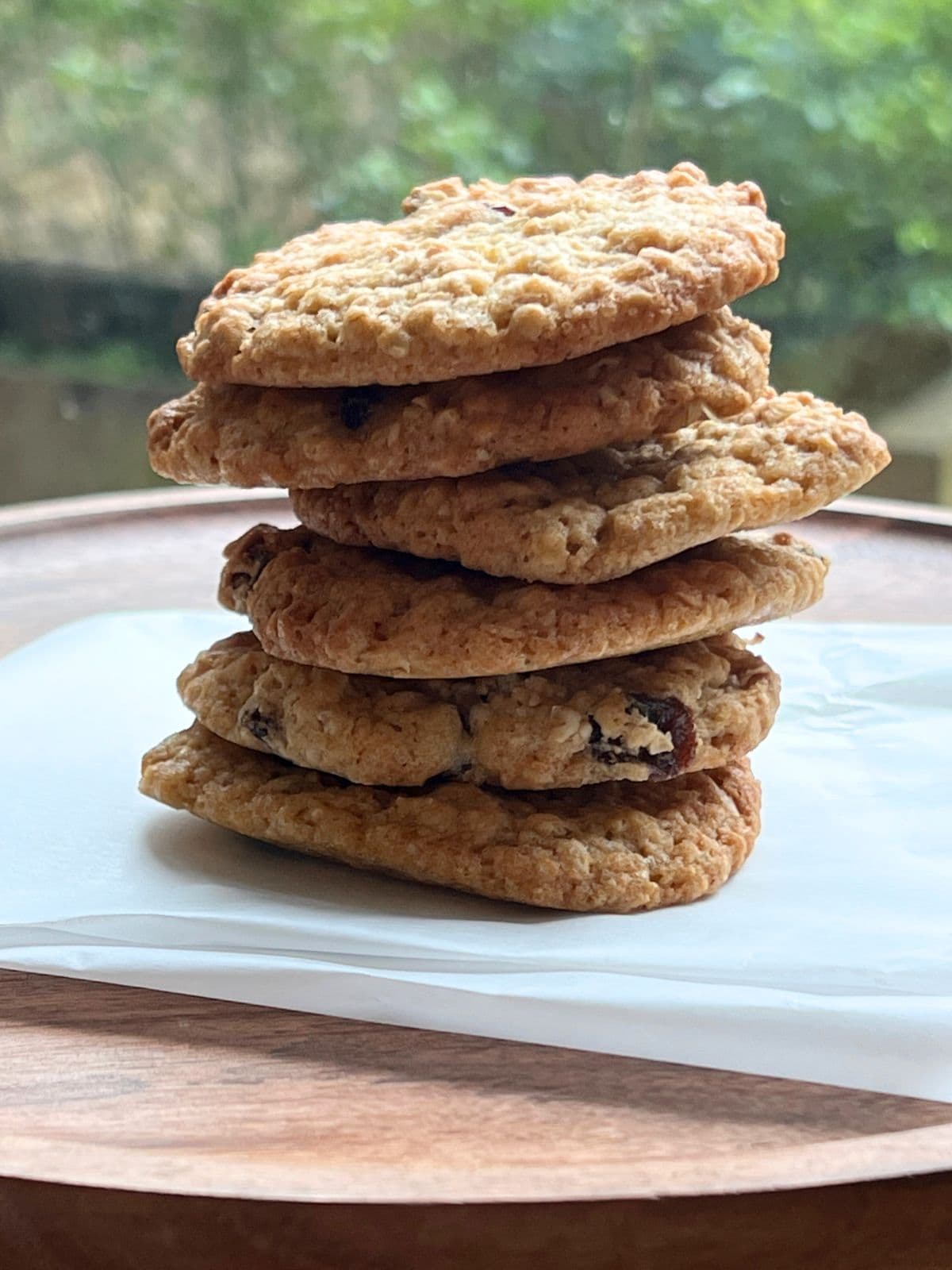 Stack of cookies on parchment paper.