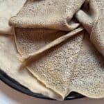 Ethiopian teff flatbread on a tray.